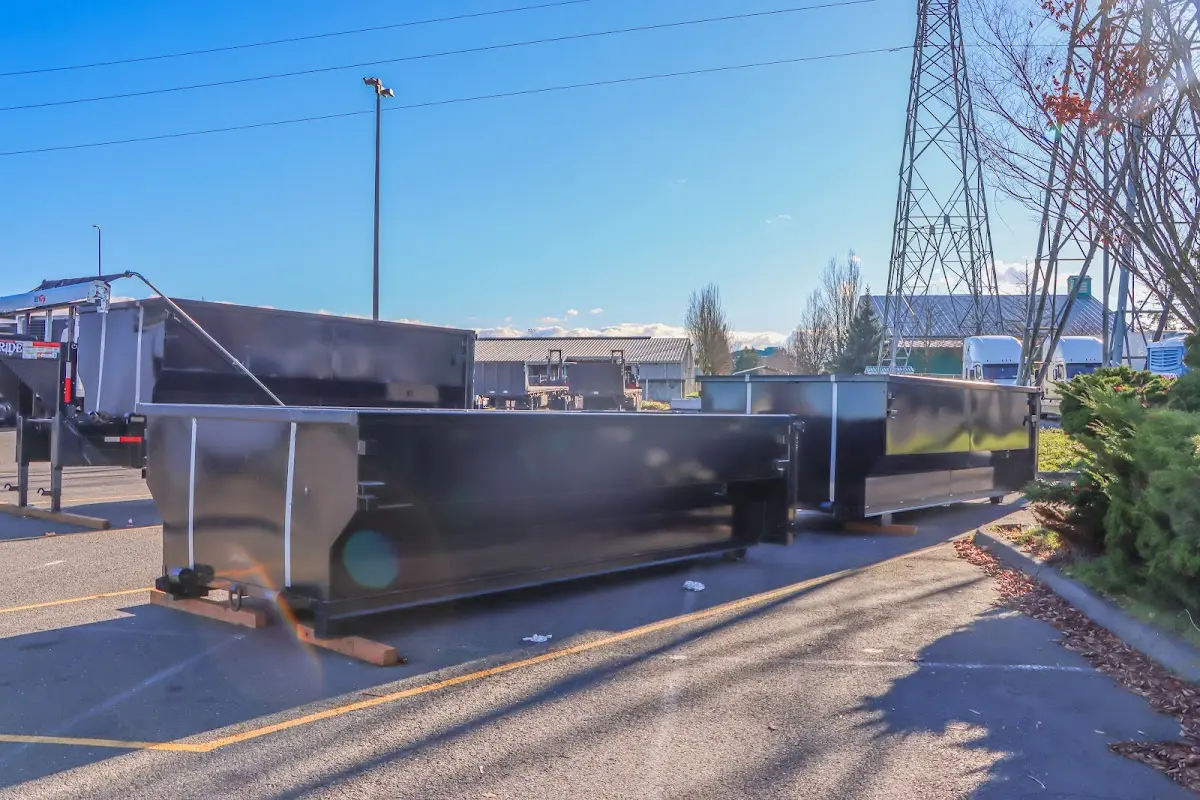 Roll-off dumpster ready for waste disposal at job site for 2 Yard Dumpster Rental in Yankton